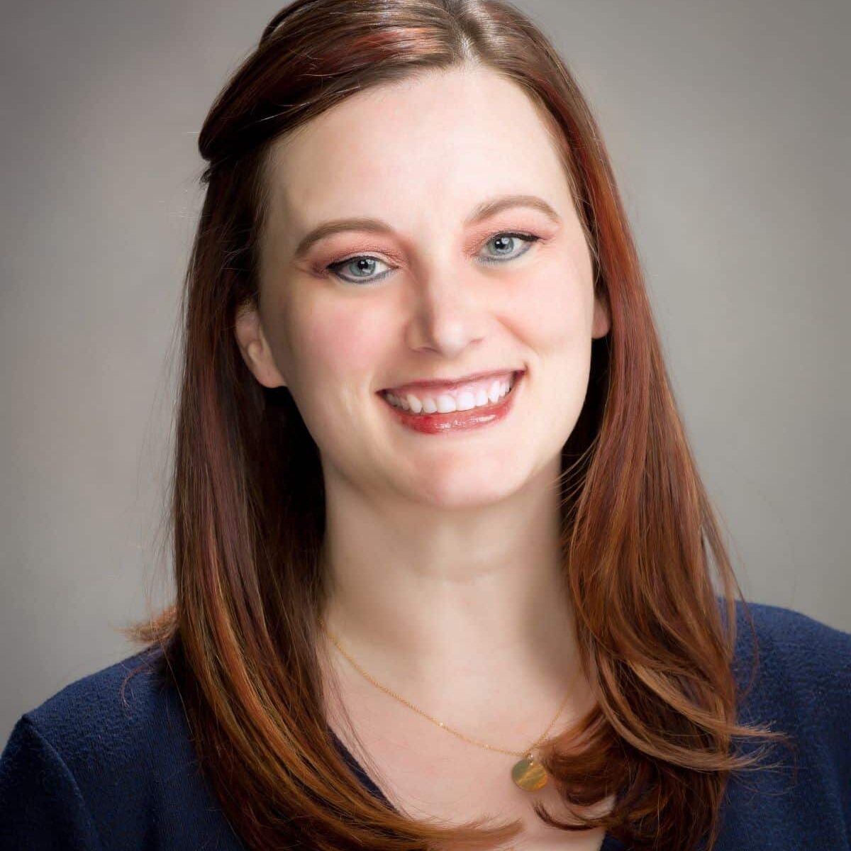 Headshot of Senior National Account Manager Rachel Miles, who teaches wellness professionals like hairstylists, barbers, and massage therapists about claims protection.